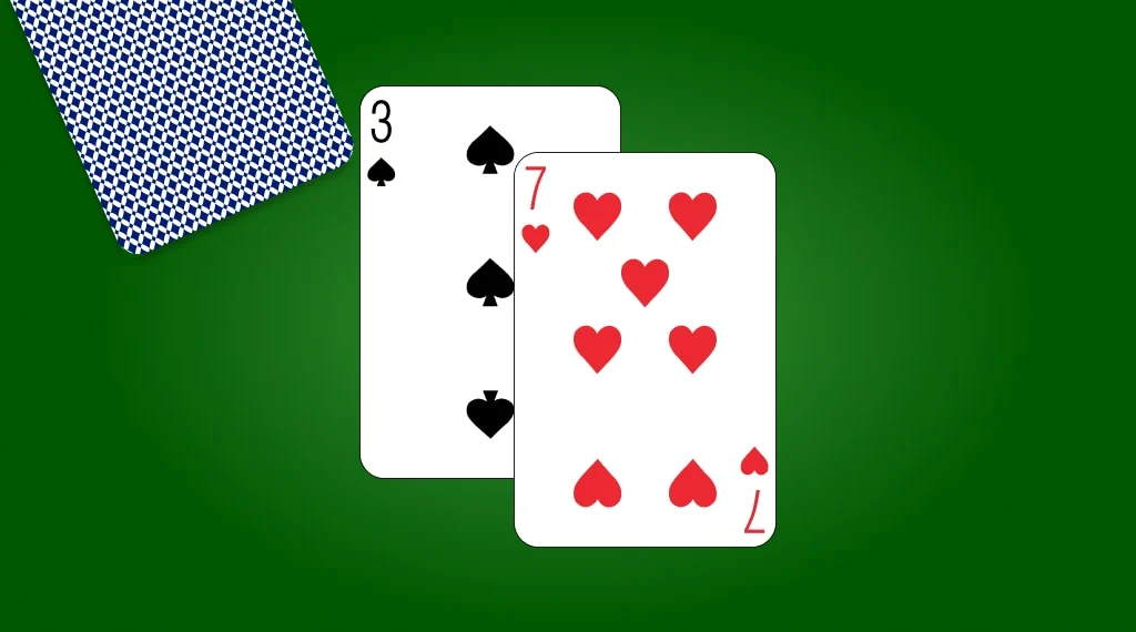 Blackjack cards (spades three and hearts seven)